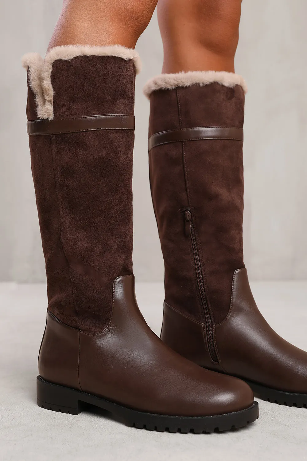 KENDRA KNEE HIGH BOOTS WITH FUR TRIM AND LINING IN DARK BROWN SUEDE AND FAUX LEATHER