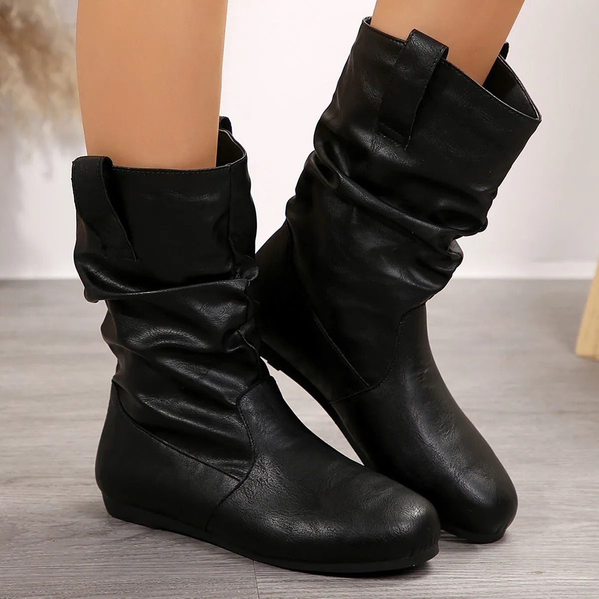 Women's flat slouchy mid calf boots